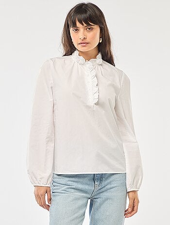 Blusa con volant sul collo e sull'apertura