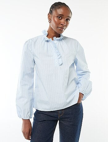 Blusa con volant sul collo e sull'apertura