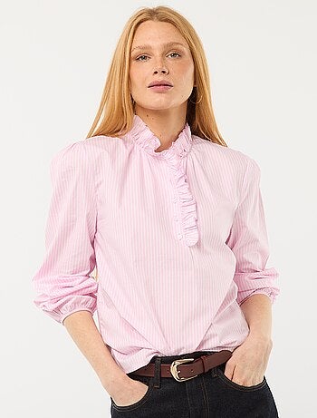 Blusa con volant sul collo e sull'apertura