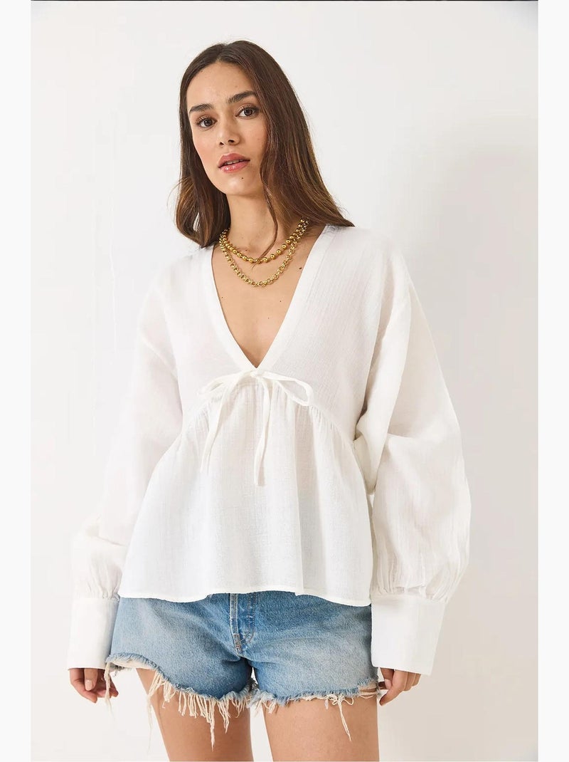 Blusa corta testurizzata scollo a v con fiocco lucci Bianco - Kiabi