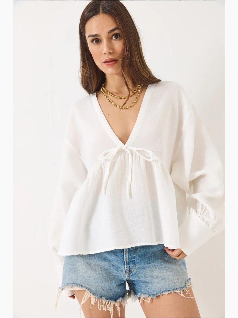 Blusa corta testurizzata scollo a v con fiocco lucci Bianco - Kiabi