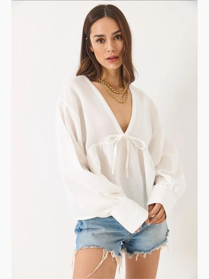 Blusa corta testurizzata scollo a v con fiocco lucci Bianco - Kiabi