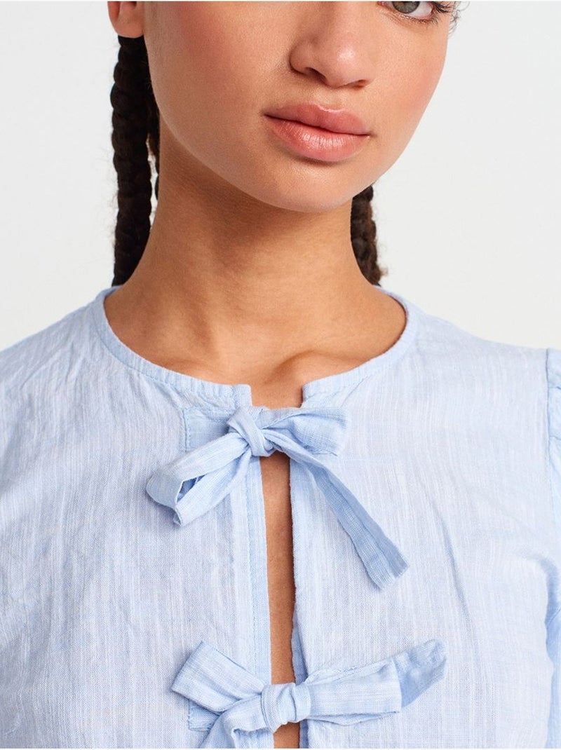 Blusa crop da donna con dettaglio fiocco dilvin Blu pastello - Kiabi