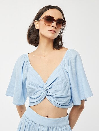 Blusa cropped con fiocco fantasia e maniche a farfalla