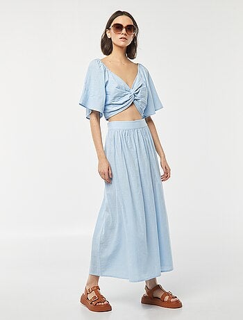 Blusa cropped con fiocco fantasia e maniche a farfalla