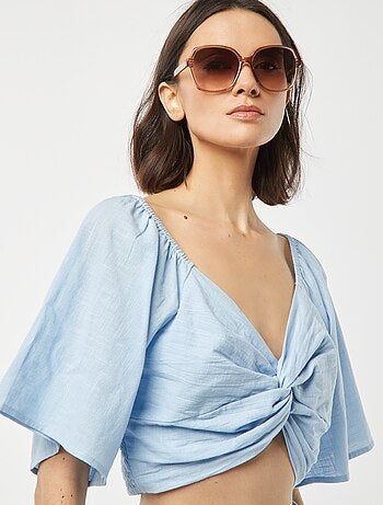 Blusa cropped con fiocco fantasia e maniche a farfalla