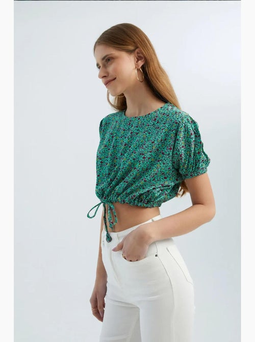 Blusa floreale con scollo tondo e coulisse hiccup - Kiabi Blusa floreale con scollo tondo e coulisse hiccup - Kiabi
