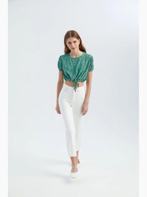 Blusa floreale con scollo tondo e coulisse hiccup - Kiabi Blusa floreale con scollo tondo e coulisse hiccup - Kiabi