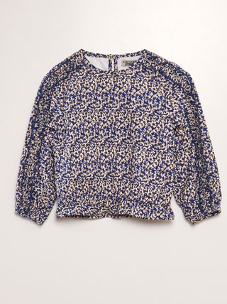 Blusa floreale con volant