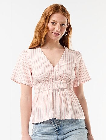 Blusa fluida a taglio svasato