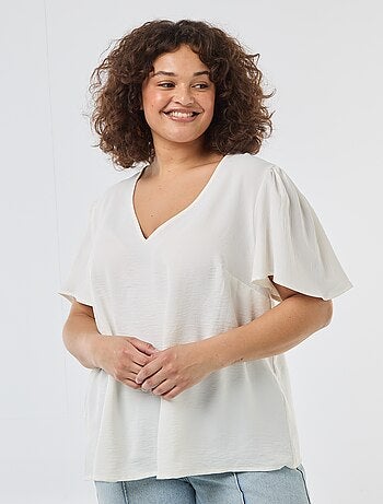 Blusa fluida tinta unita a maniche corte