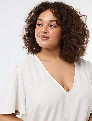 Blusa fluida tinta unita a maniche corte