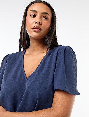 Blusa fluida tinta unita a maniche corte