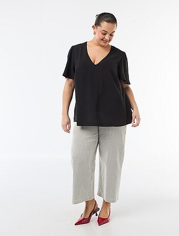 Blusa fluida tinta unita a maniche corte