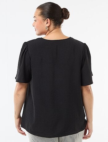 Blusa fluida tinta unita a maniche corte