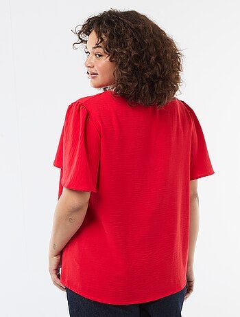 Blusa fluida tinta unita a maniche corte