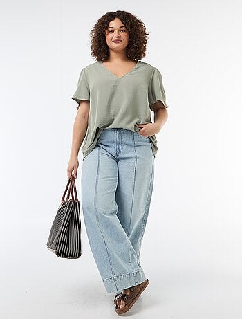 Blusa fluida tinta unita a maniche corte