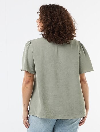 Blusa fluida tinta unita a maniche corte