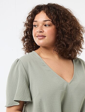 Blusa fluida tinta unita a maniche corte