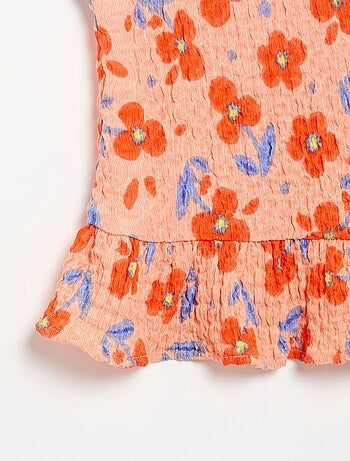 Blusa goffrata senza maniche