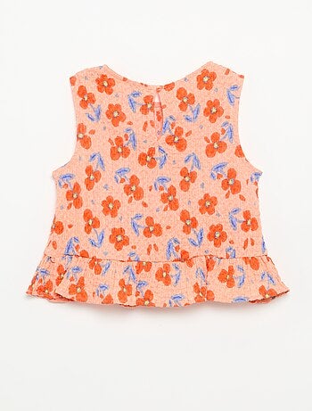 Blusa goffrata senza maniche