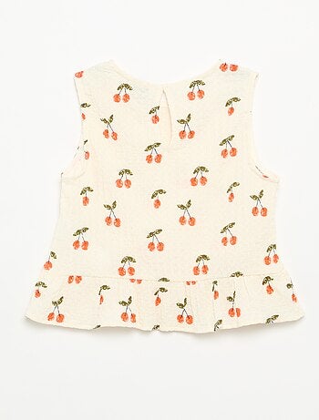 Blusa goffrata senza maniche
