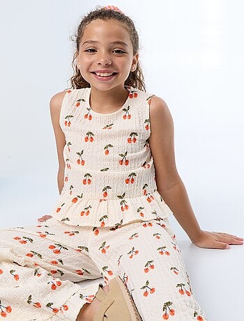 Blusa goffrata senza maniche