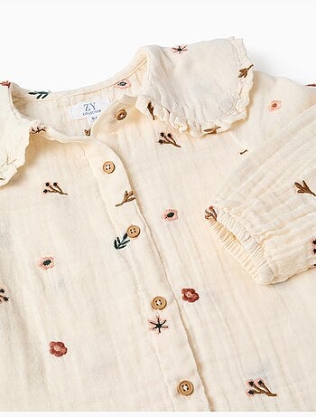 Blusa in cotone a manica lunga con fiori ricamati