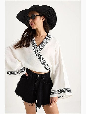 Blusa in cotone lucci