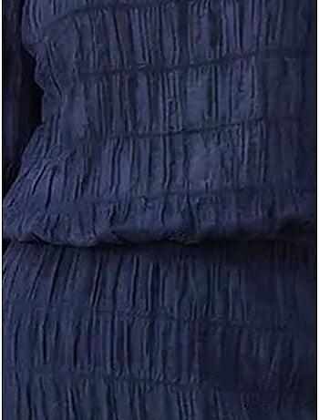 Blusa in cotone testurizzato e set con gonna maxi lucci