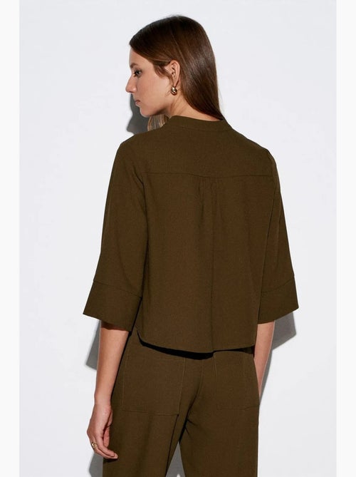 Blusa in crêpe collo alla coreana dilvin - Kiabi Blusa in crêpe collo alla coreana dilvin - Kiabi
