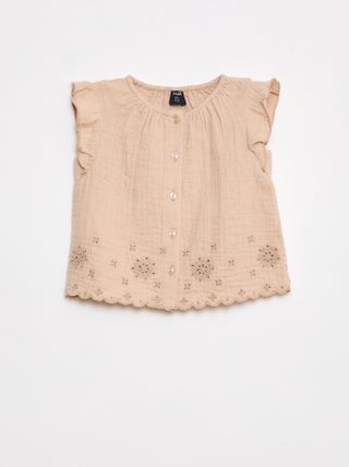 Blusa in garza di cotone con volant sulle maniche corte