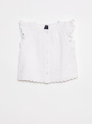 Blusa in garza di cotone con volant sulle maniche corte