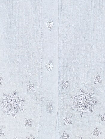 Blusa in garza di cotone con volant sulle maniche corte