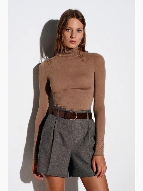 Blusa in jersey a collo alto slim fit dilvin - Kiabi Blusa in jersey a collo alto slim fit dilvin - Kiabi