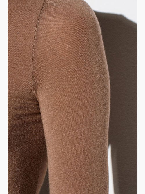 Blusa in jersey a collo alto slim fit dilvin - Kiabi Blusa in jersey a collo alto slim fit dilvin - Kiabi
