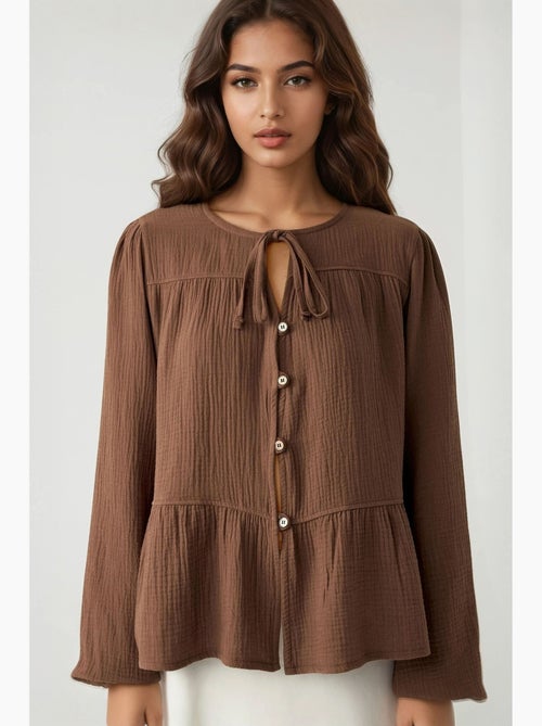 Blusa in mussola tessuta con girocollo e maniche lunghe hiccup - Kiabi Blusa in mussola tessuta con girocollo e maniche lunghe hiccup - Kiabi