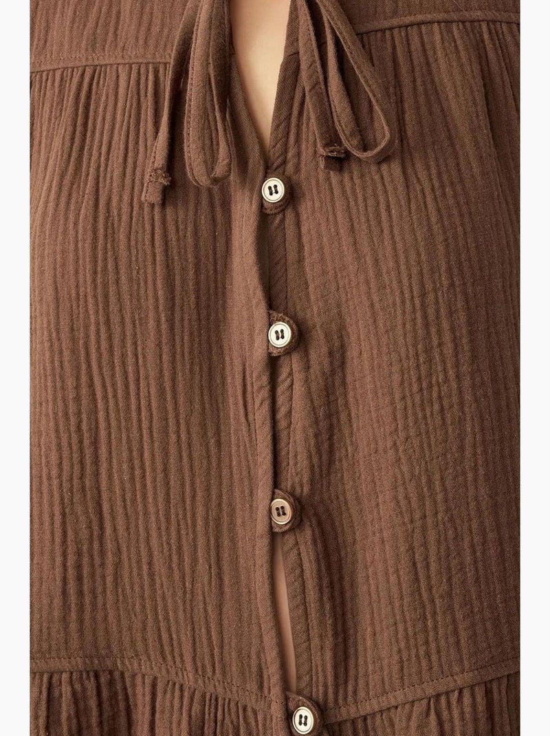 Blusa in mussola tessuta con girocollo e maniche lunghe hiccup Marrone chiaro - Kiabi