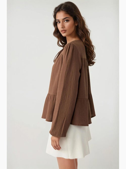 Blusa in mussola tessuta con girocollo e maniche lunghe hiccup - Kiabi Blusa in mussola tessuta con girocollo e maniche lunghe hiccup - Kiabi