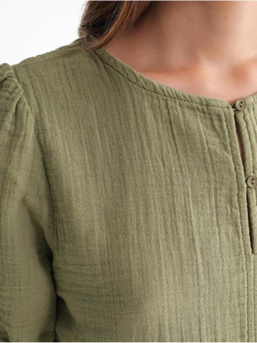 Blusa in mussola testurizzata con scollo tondo e bottoni mixray - Kiabi Blusa in mussola testurizzata con scollo tondo e bottoni mixray - Kiabi