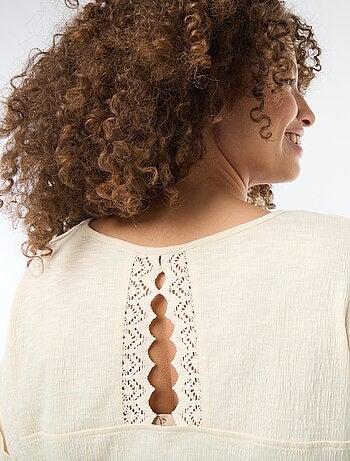 Blusa in tessuto crêpe a maniche corte