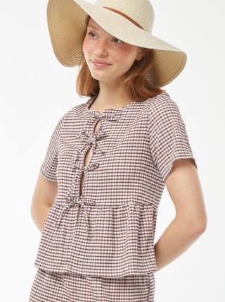 Blusa in tessuto effetto crêpe con apertura da annodare