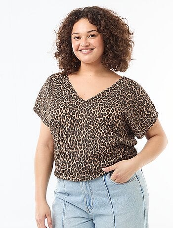 Blusa in tessuto goffrato a maniche corte