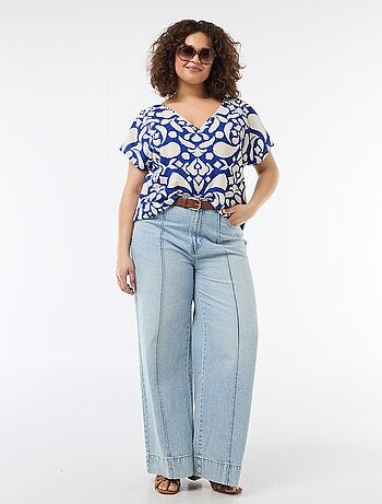 Blusa in tessuto goffrato a maniche corte