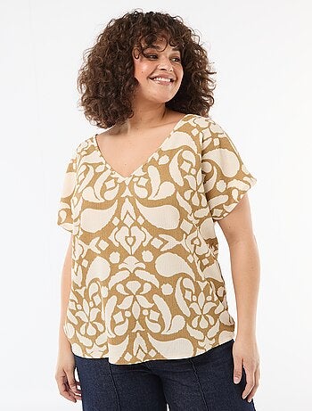 Blusa in tessuto goffrato a maniche corte