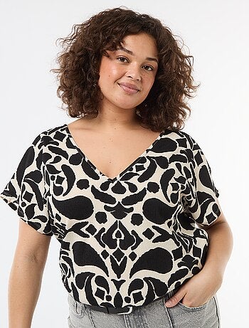 Blusa in tessuto goffrato a maniche corte