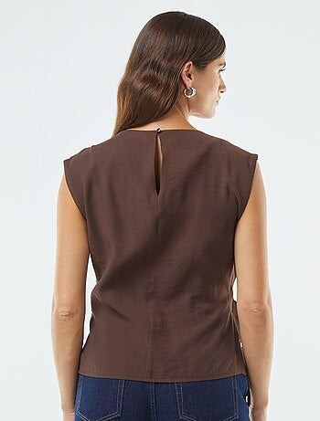 Blusa larga con fibbia integrata