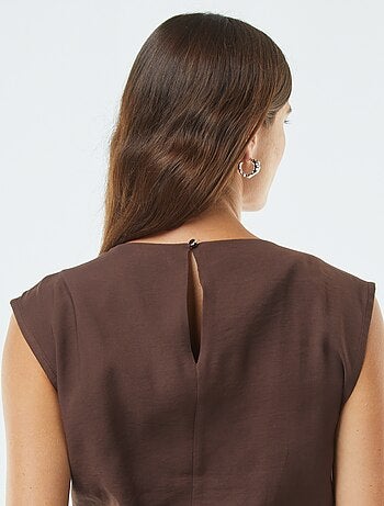 Blusa larga con fibbia integrata
