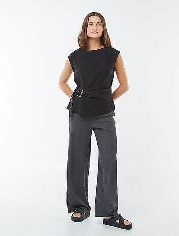 Blusa larga con fibbia integrata