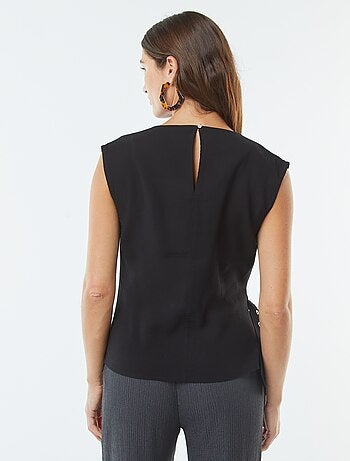 Blusa larga con fibbia integrata